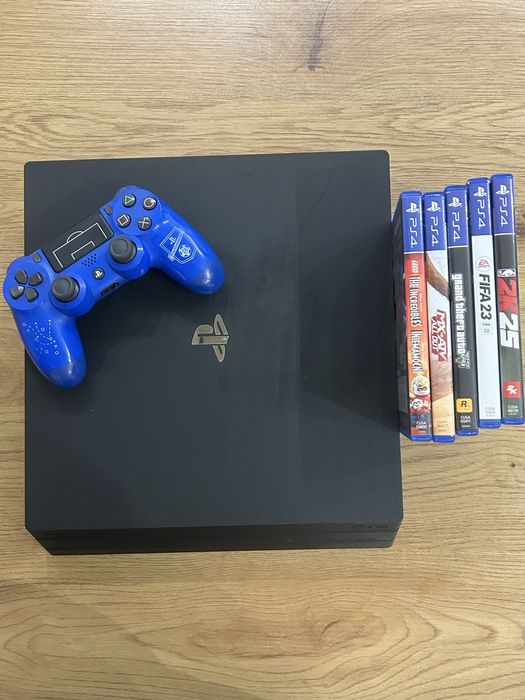 PS4 Pro 1Tb + kontroler + gry