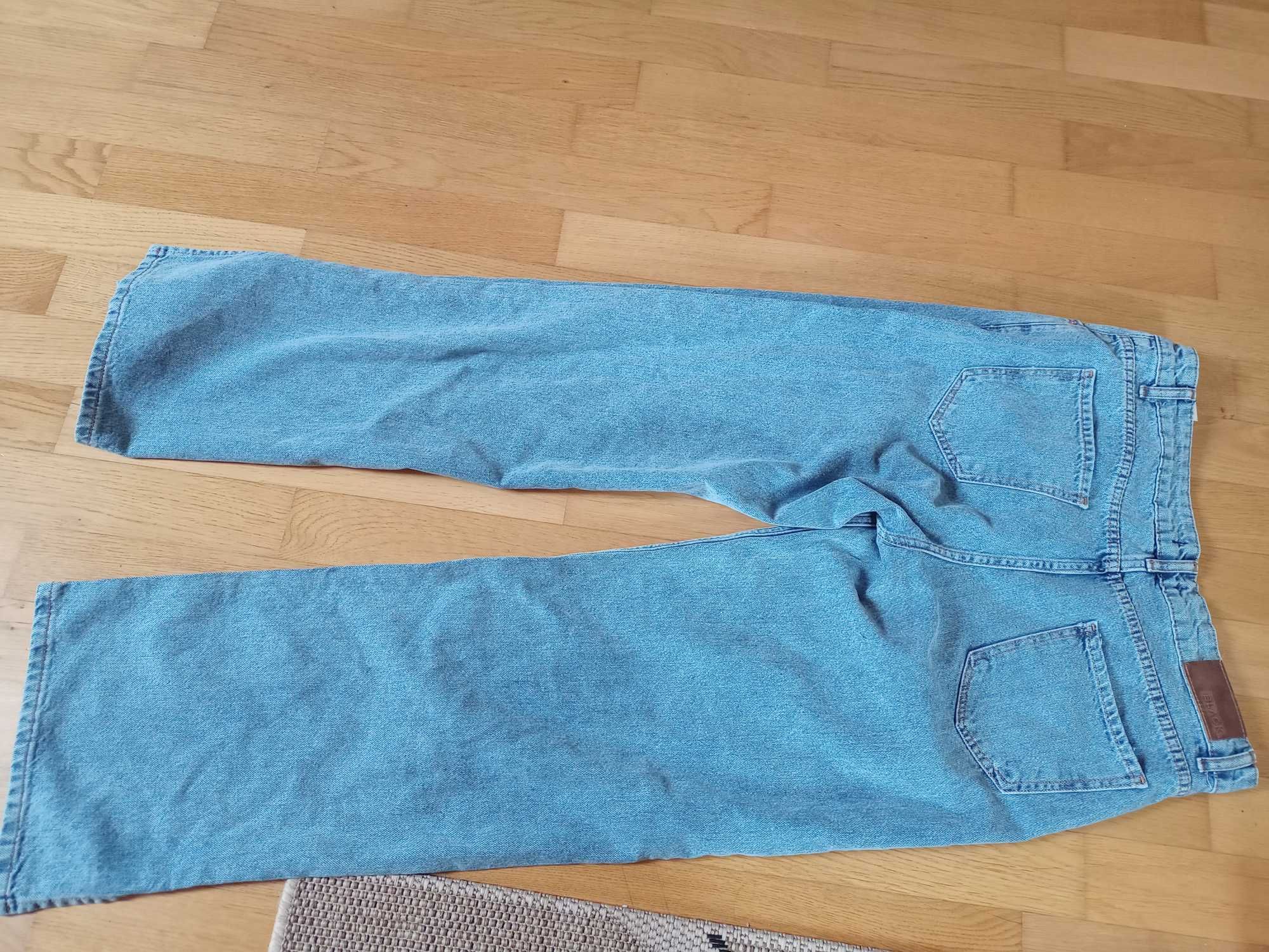 Damskie spodnie dżinsowe 40