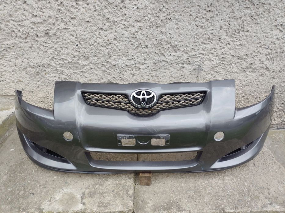ZDERZAK PRZÓD PRZEDNI TOYOTA AURIS E15 07/10r