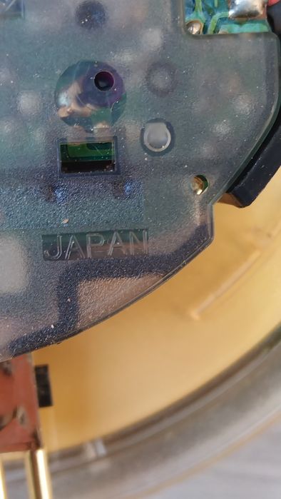 Rhythm часы настенные с маятником.