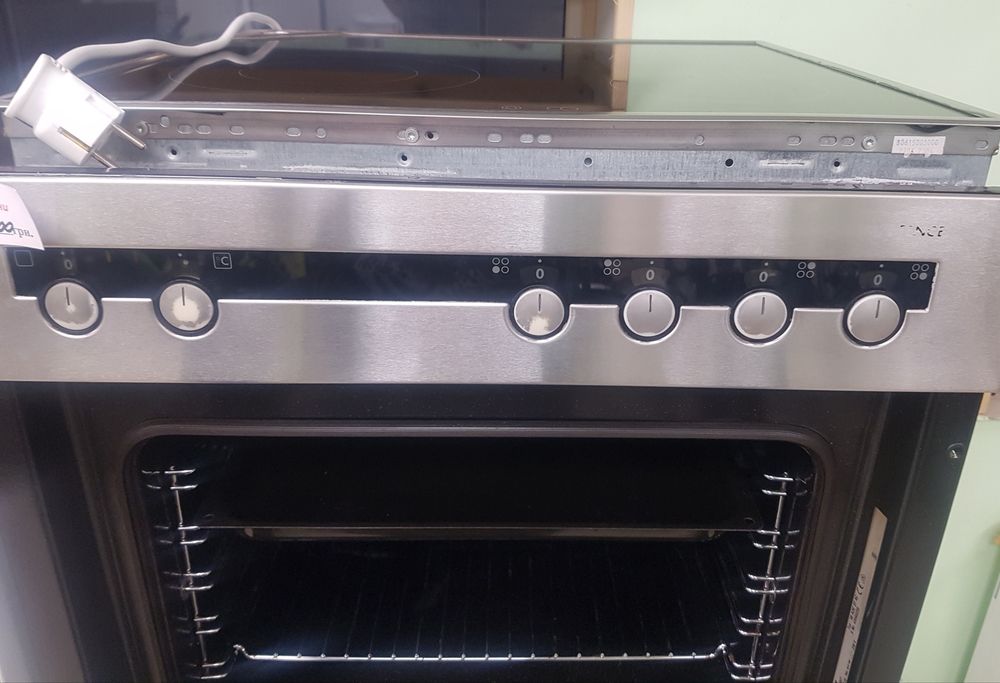 Електропоита вбудована + Електродуховка із конвекцією AEG E- 4000.