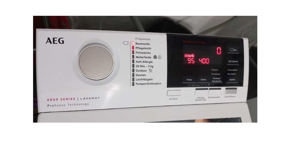 Пральна машина AEG L6TBA664 верхнє (вертикальне) 6кг а+++