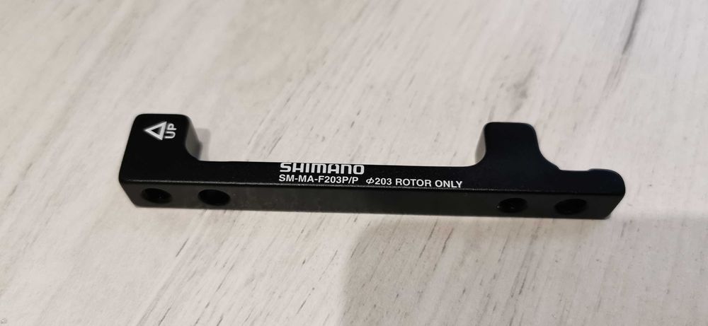 Adapter hamulca Shimano SM-MA-F203P/P przód/tył do tarcz 203mm