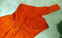 Pomarańczowa sukienka z falbanami