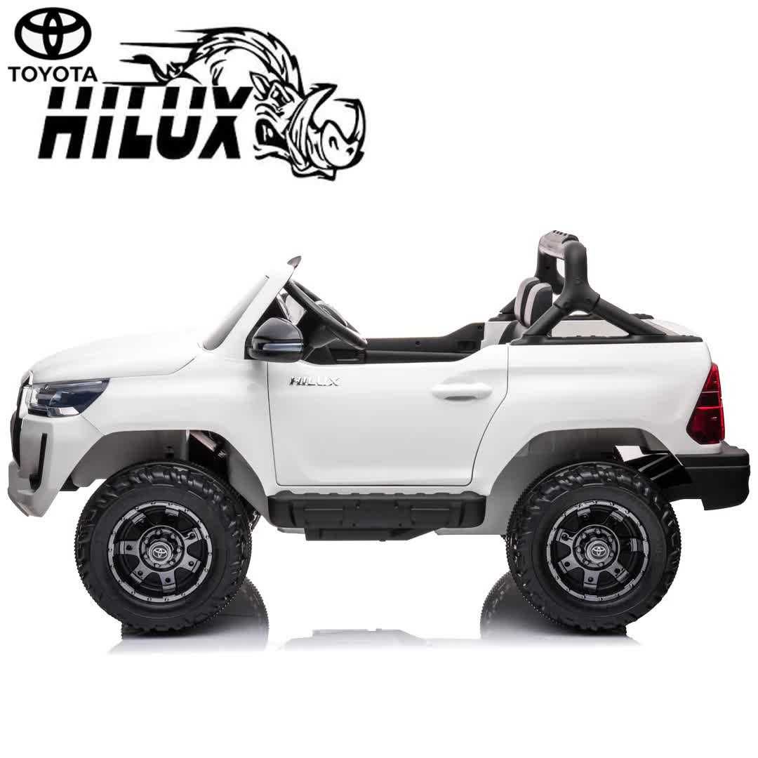 Дитячий електромобіль  Джип Toyota Hilux M 4919 на пульті р у