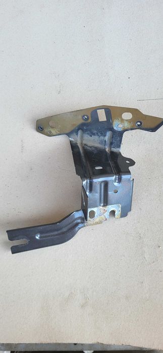 Wspornik mocowanie uchwyt błotnika zderzak LEWY PEUGEOT 2008 II