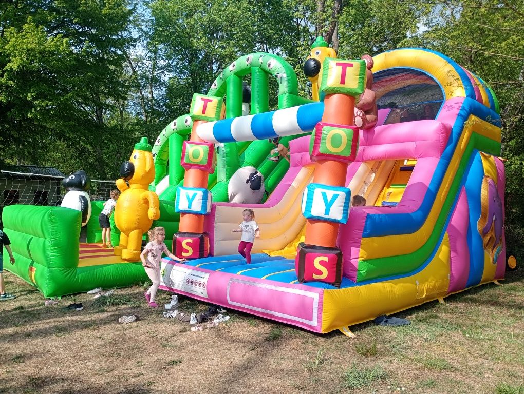 Zamek  dmuchaniec skakaniec zjeżdżalnia, piana party