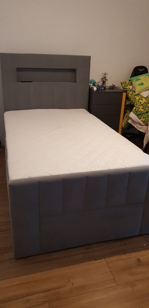 Łóżko tapicerowane , kontynentalne z toperemm 120x200