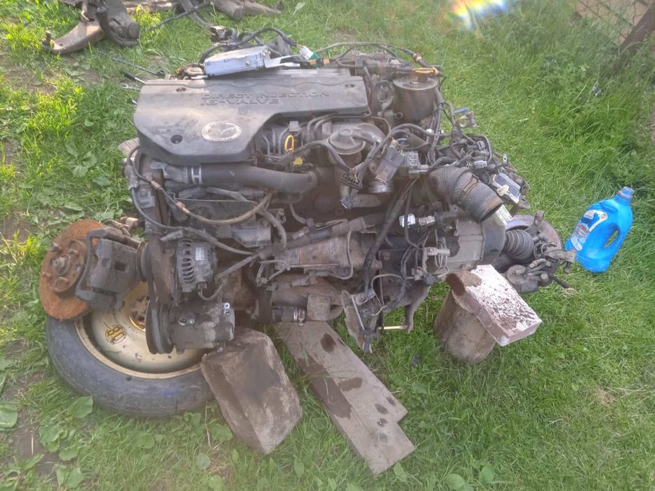 Продається мотор й коробка  мазда 323f 2.0 TDі  2002 рік з проводкою