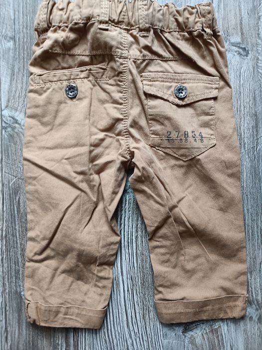 Spodnie chłopięce dziecięce niemowlęce Next 6-9 miesięcy na gumce