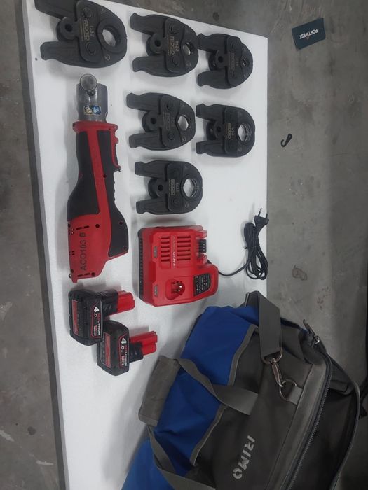 Zaciskarka do rur RIDGID ACO103 + szczęki U/M + akumulatory Milwaukee