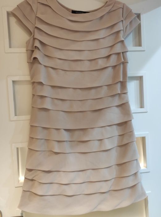 Pudrowa sukienka Reserved rozmiar 34