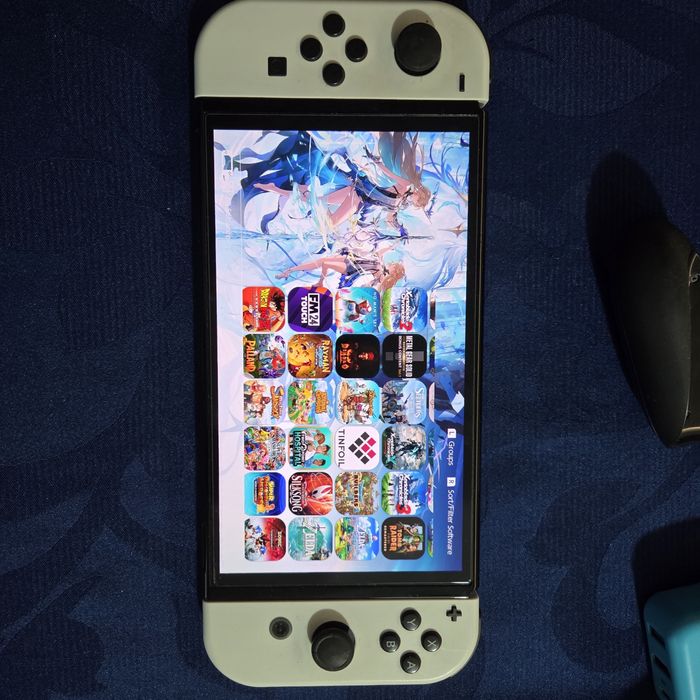 Nintendo Switch Oled desbloqueada + Extras