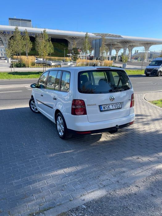 Volkswagen Touran 1.4 LPG**Zamiana**7-Osobowy**Gwarancja**Hak**Klima**