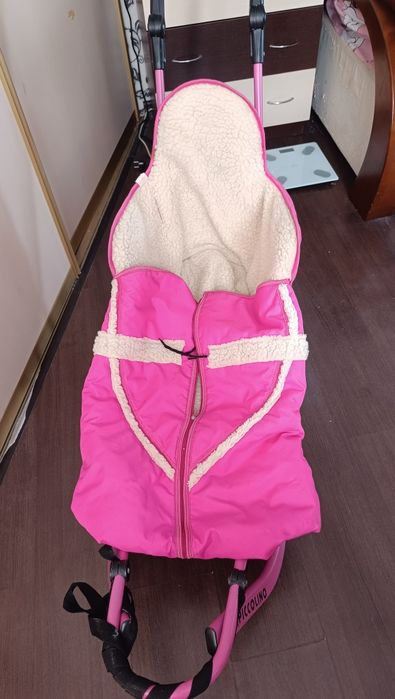 Продам санки малинового цвета