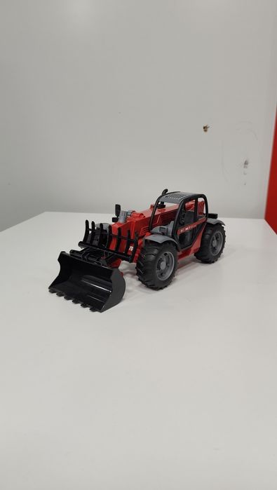 Bruder Дорожній навантажувач із телескопічною стрілою MLT 633