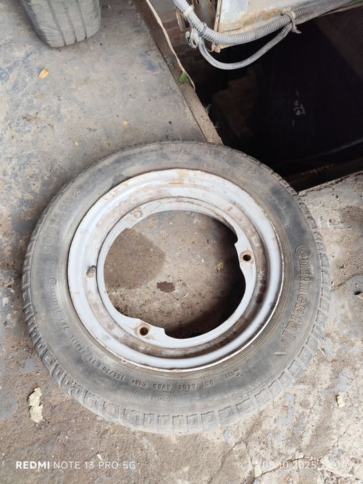 Продам диск с покрышкой на Таврию