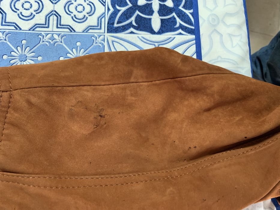 Casaco de pele genuina