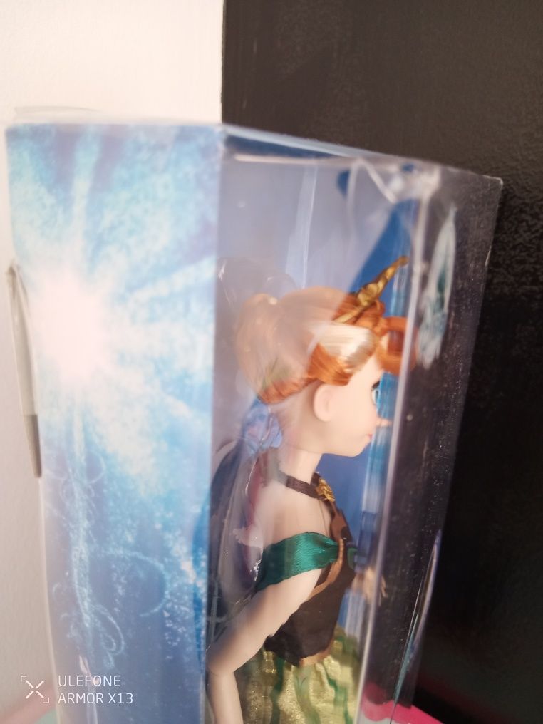 Brinquedo Boneca 30cm Singing Anna Frozen música Love is an open door.