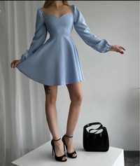 Голуба сукня
