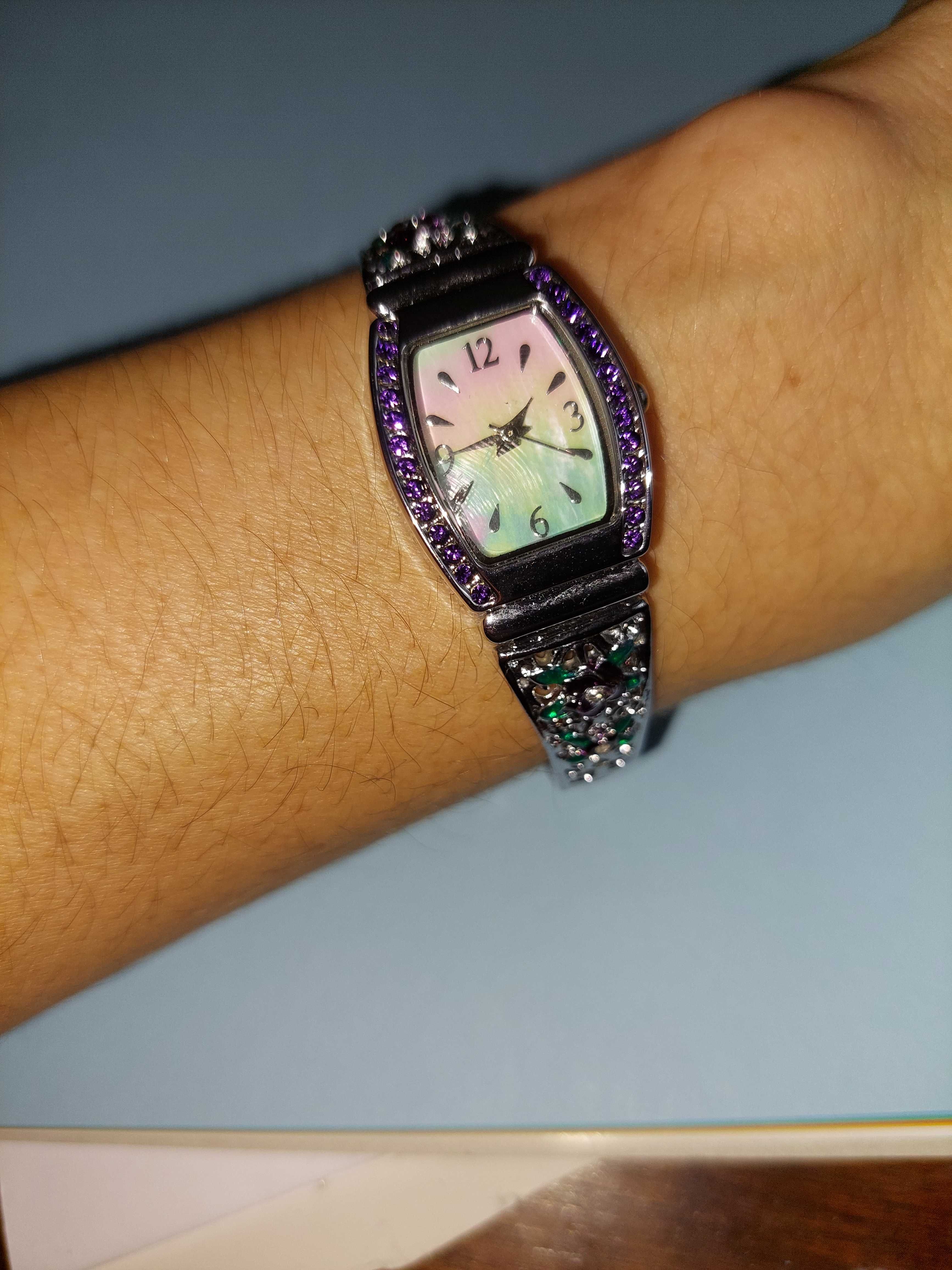 Damski zegarek na rękę z motywem róży srebrny