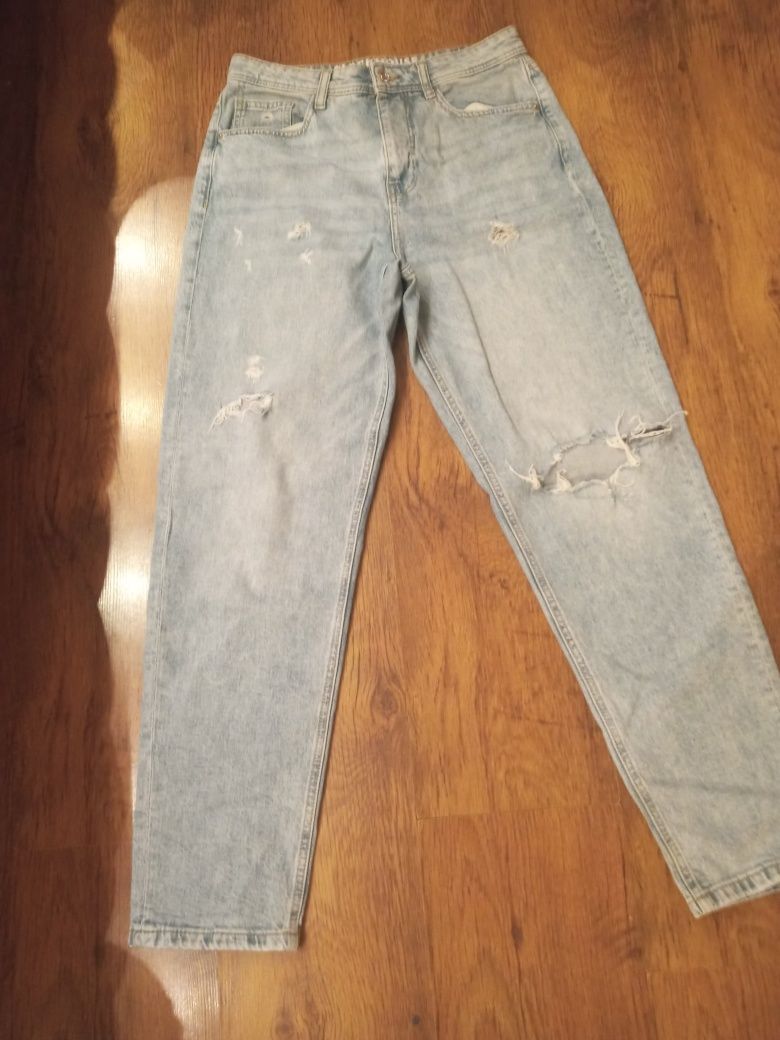 spodnie jeans z dziurami