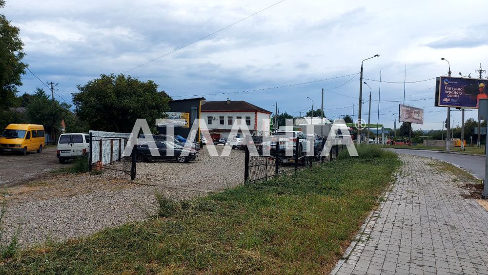 Земельна ділянка 26 соток з СТО, мийкою та готелем