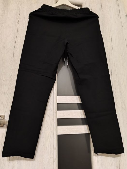 Spodnie 3/4 dziewczęce M