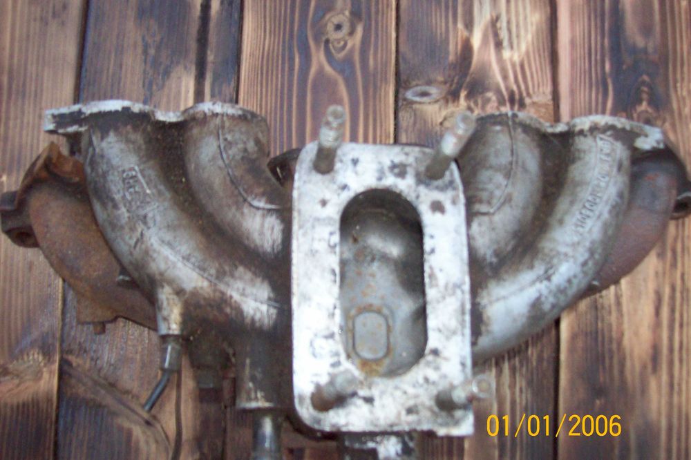 впускний колектор та випускний