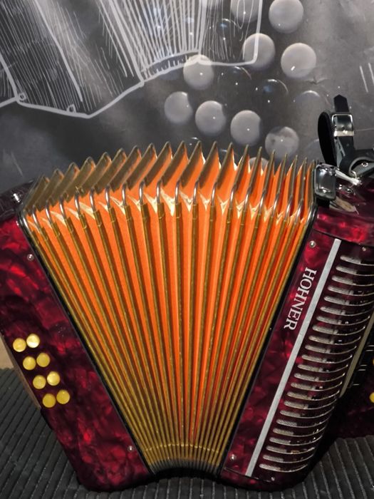 Concertina hohner está em fã lá ré