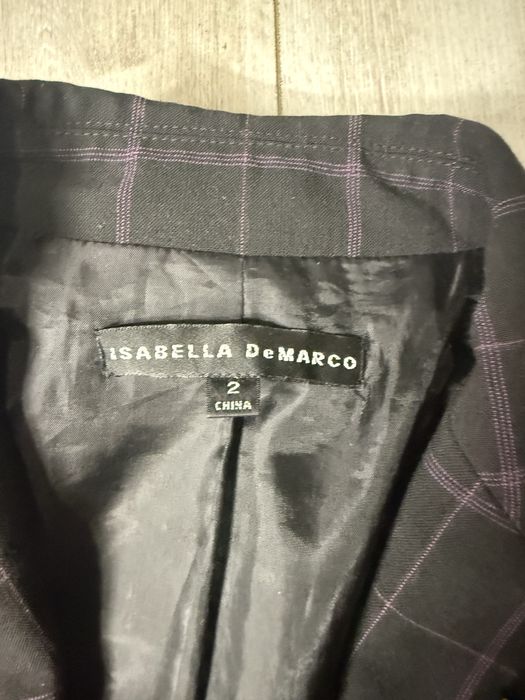 Піджак в полоску-клітинку