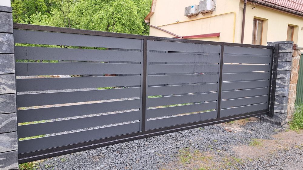 Відїздні ворота Двигуни.Наповнення воріт.ЖалюзіРанчоШтахети.Профнастил