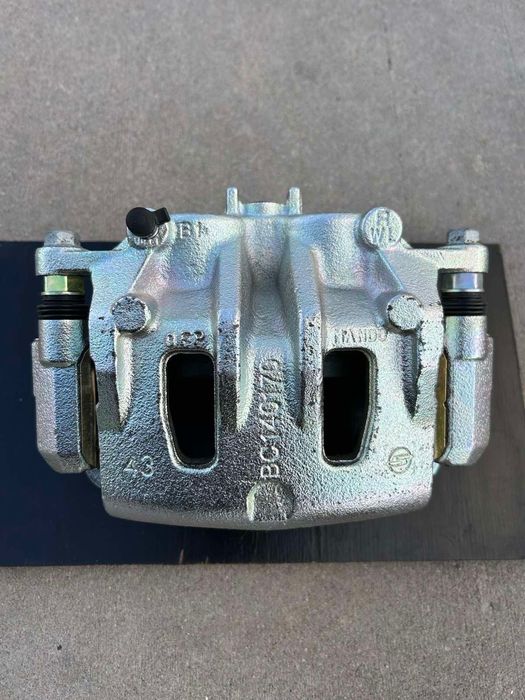 Супорт передній правий