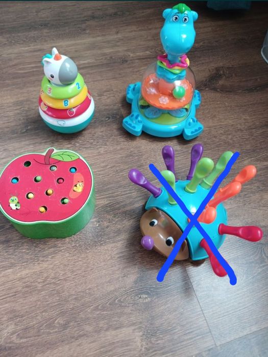 Рибалка,неваляшка,пірамідка,іграшка