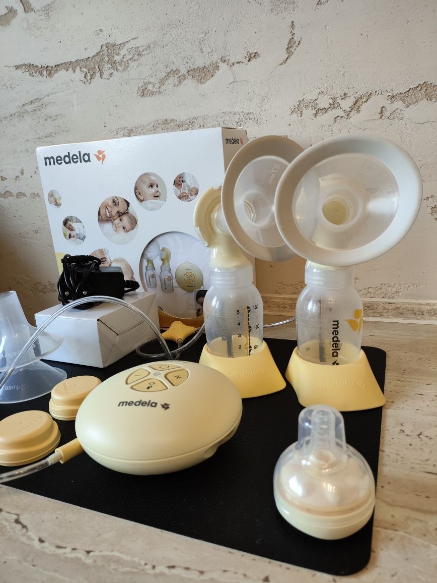 Laktator Medela Swing Maxi + calma