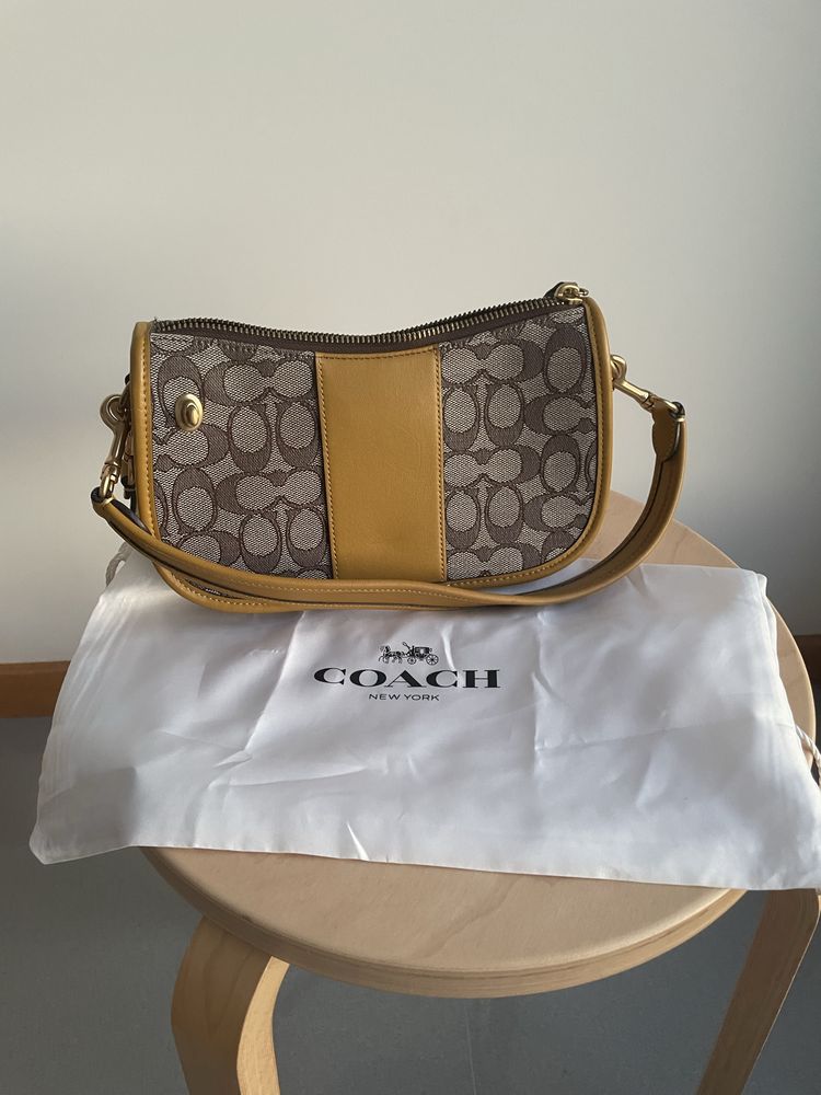 Bolsa Coach amarelo torrado