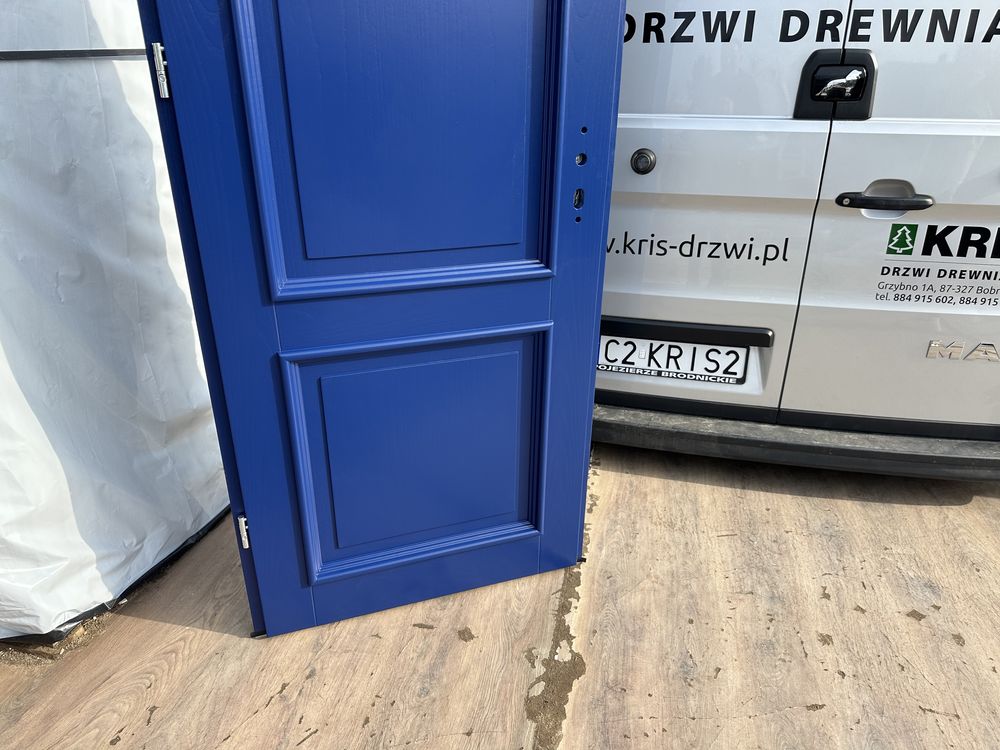 Drzwi drewniane wejściowe zewnętrzne wewnątrzklatkowe