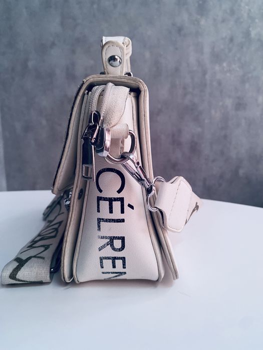 Жіноча сумочка біла