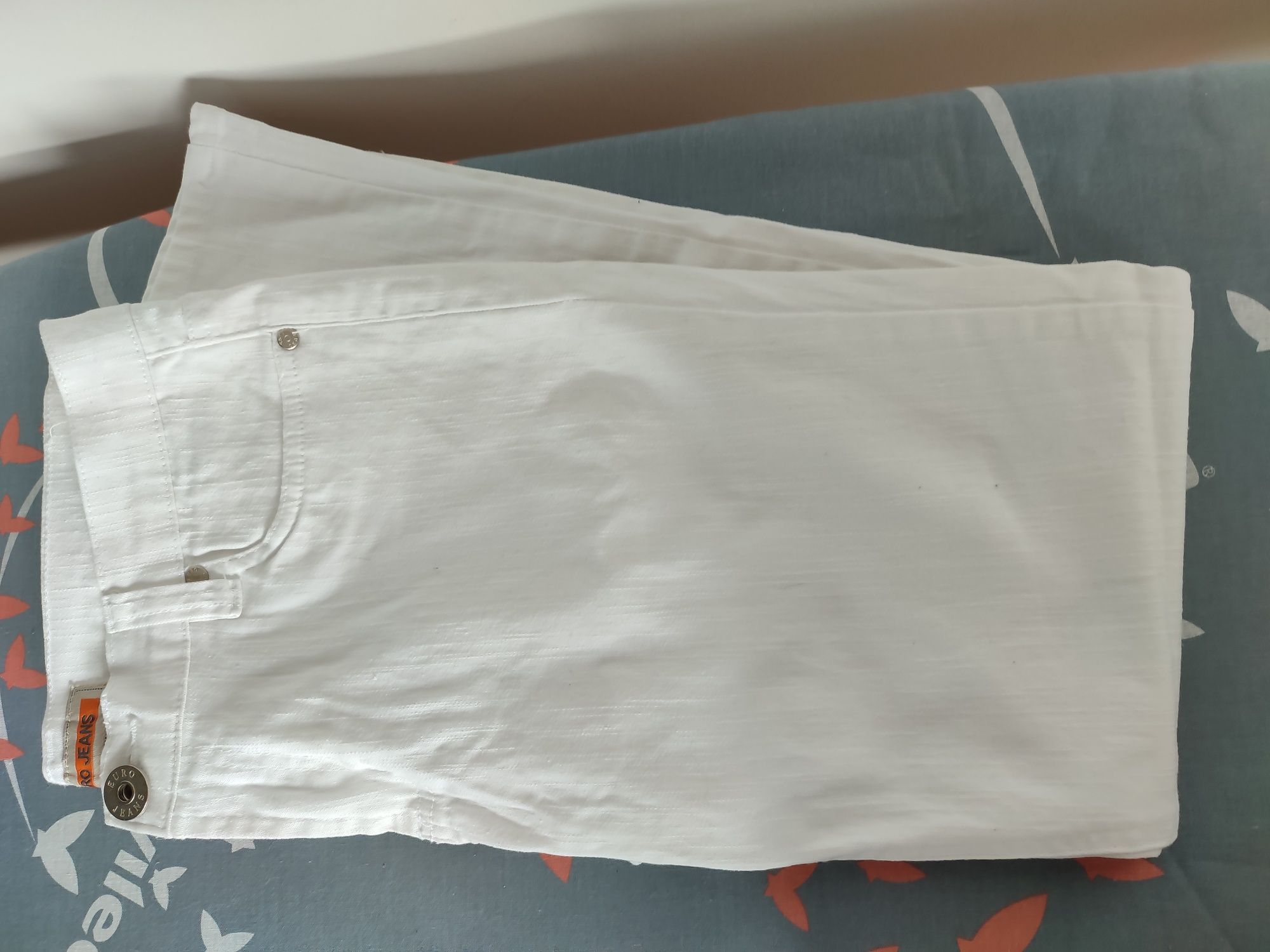 Białe bawełniane spodnie damskie w pasie 90 cm