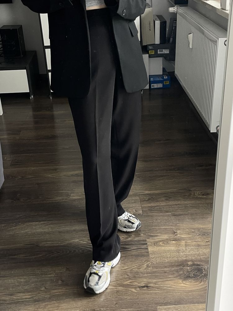 Szerokie garniturowe spodnie na kant na 160 cm