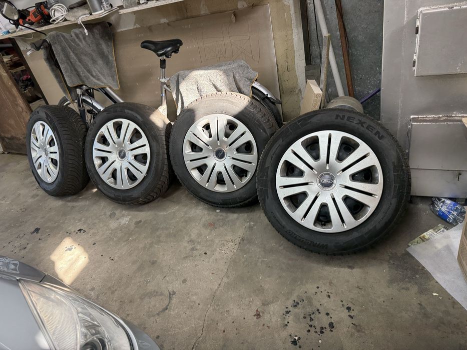 Sprzedam  kola z oponami zimowymi do forda 215/50/16