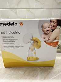 Молокоотсос Medela