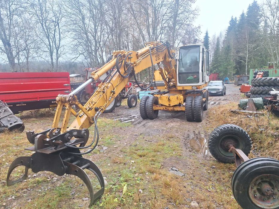 Koparka kołowa Liebherr 312 + rototil