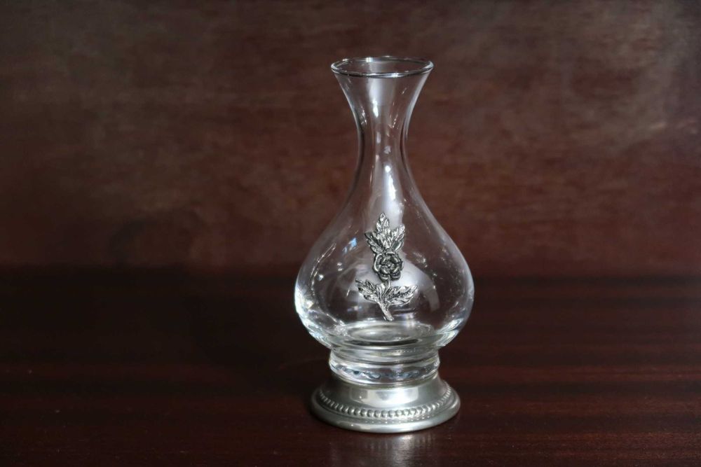 Frasco com aplicações em estanho