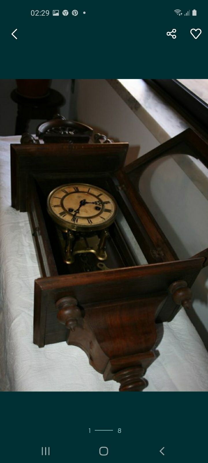 Relógio antigo em madeira