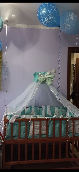 Дитяче ліжечко з балдахіном,матрасом боковинками і постільним