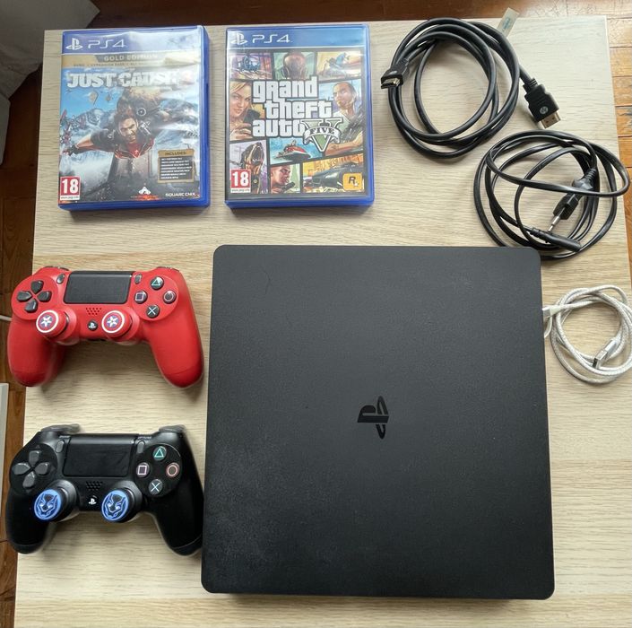 PS4 Slim 1 TB + 2 Comandos + 2 Jogos
