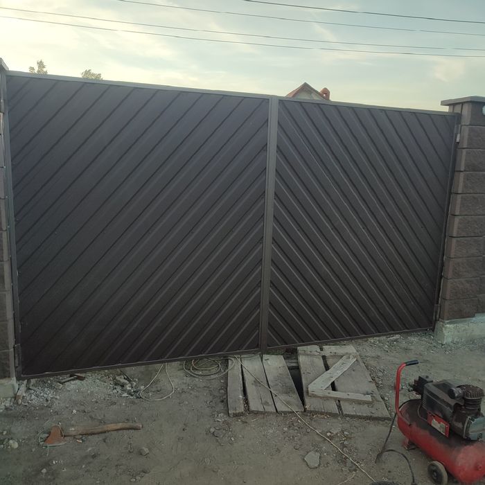 Ворота,откатные, консольные, распашные гаражные,вьездные,кованные,проф