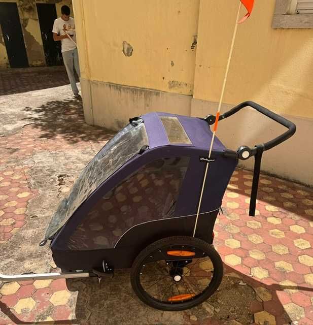 Atrelado de bicicleta para crianças