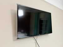 Televisão + suporte de parede (não liga)